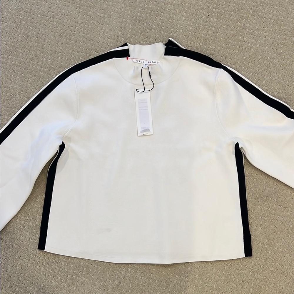 Veronica Beard White and Black Top, with neck zipper on the left side.